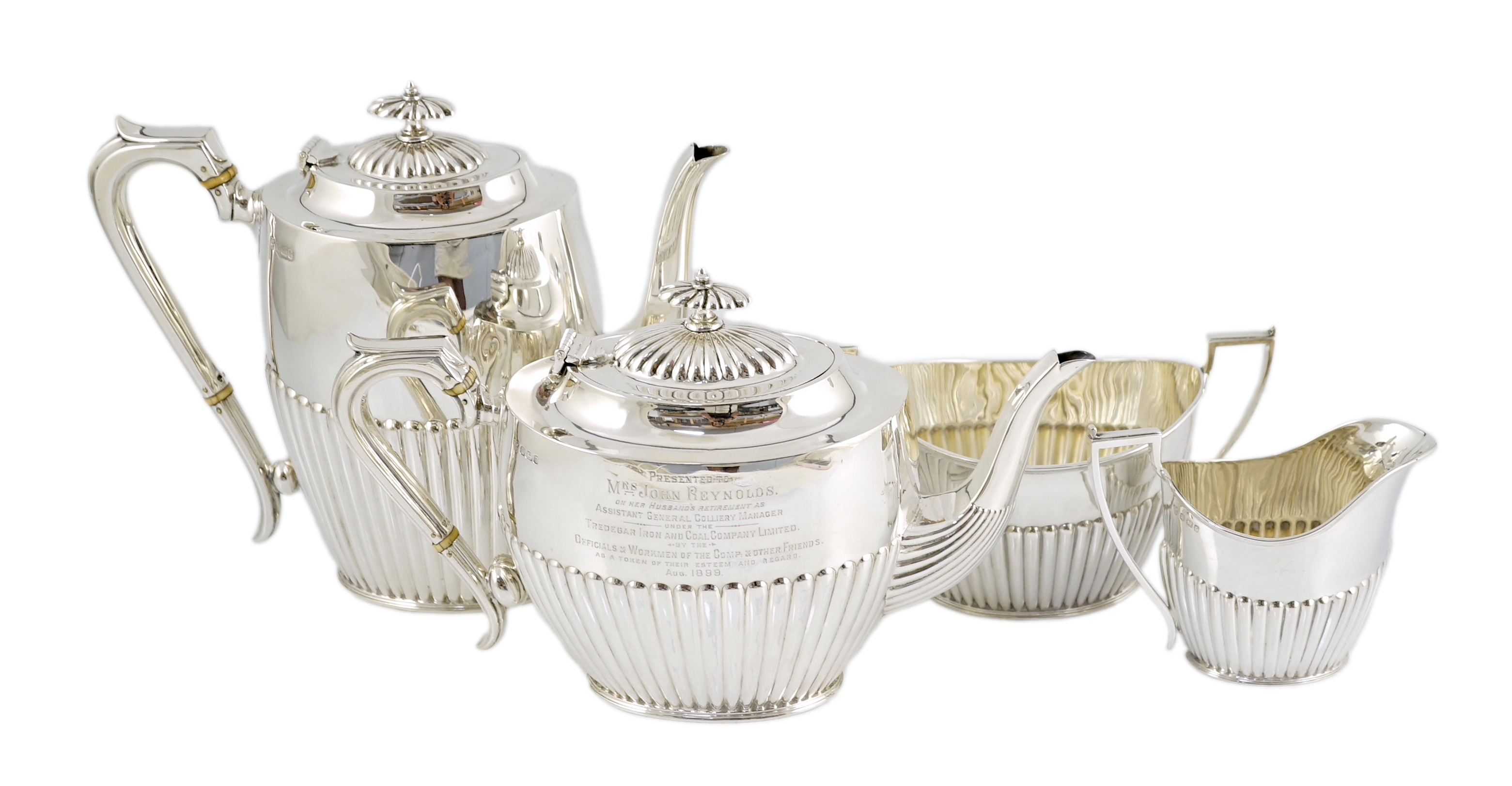 A late Victorian demi fluted silver four piece tea and coffee set, by Wakely & Wheeler